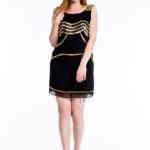Couture Kleid von Romeo und Juliet mit schwarz, goldenen Pailletten besetzt., Romeo & Juliet M